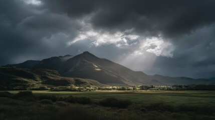 Obraz premium Sunlight breaking through dreamy stormy clouds, cinematic glow