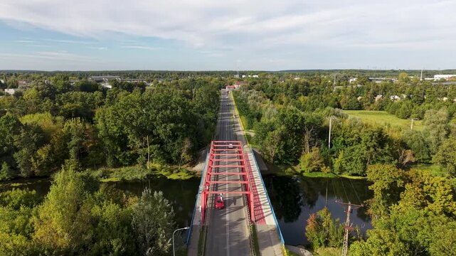 Aerial Bydgoszcz Poland river bridge traffic overhead. Historic population center. Northern Poland. River Brda inland waterway, tributary of Vistula. Host to international regatta rowing competition.