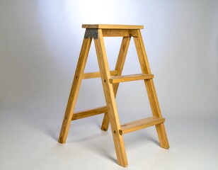 Light wooden step ladder against white background