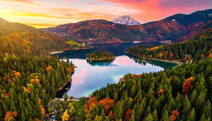 Scenic Autumn Lake View with Colorful Trees and Mountains.