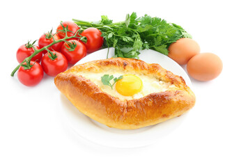 Tasty khachapuri with eggs, tomatoes and parsley isolated on white