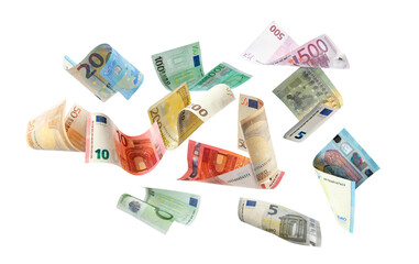 Money (euro bills) flying against white background