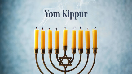 Yom Kippur candles, menorah with flames, Jewish holiday symbol, traditional candelabrum, spiritual celebration, religious background, Judaism tradition, sacred light, Hebrew heritage, solemn ritual