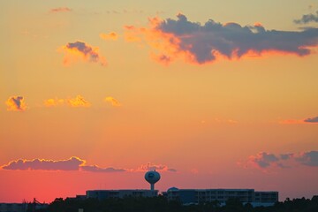 A vibrant sunset glows over Choctawhatchee Bay in Destin, Florida