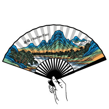 Traditional korean folding fan, known as buchae, is held open, displaying vibrant landscape painting mountains, trees, and river, isolated on transparent