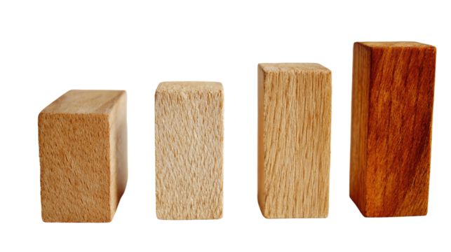 Four wooden blocks, varying in size and shade
