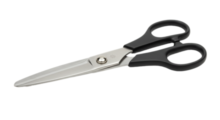 Sharp metal scissors with black handles on a black background