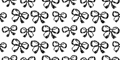 Hand drawn black and white bow pattern seamless texture with repeating bow motifs