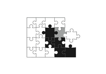 Incomplete Puzzle with Black White and Gray Pieces.