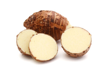 Whole and half with slice taro root on white background