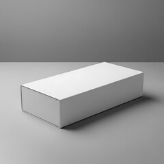 Naklejka premium A simple, minimalist presentation of a blank white box on a neutral gray backdrop.