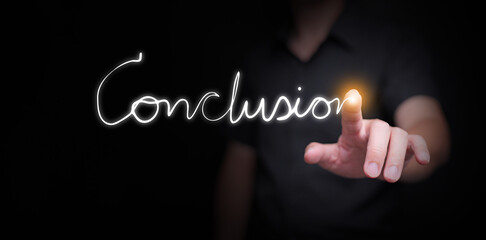 Businessman finger drawing glowing conclusion text with light effect on dark background, concept of final result, creative presentation, project closure and leadership decision making.