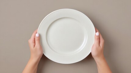 Hands gracefully cradle a pristine, empty plate, a versatile image ready to be filled with culinary possibilities. The clean.