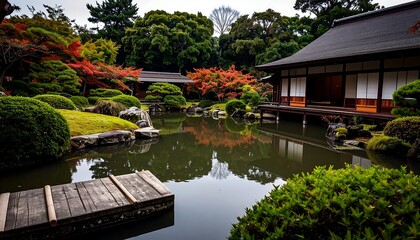Fototapeta premium Japanese garden with pond and traditional house