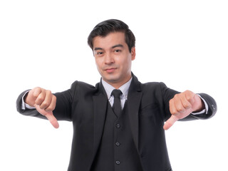 Naklejka premium Confident businessman in black suit showing double thumbs down gesture, serious male office worker expressing disapproval or negative feedback, isolated on a transparent background
