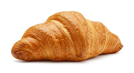 A goldenbrown croissant with visible layers and textures casting a soft shadow on a white background
