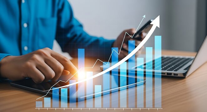 Businessman analyzing financial growth charts on a tablet and phone - Powered by Adobe