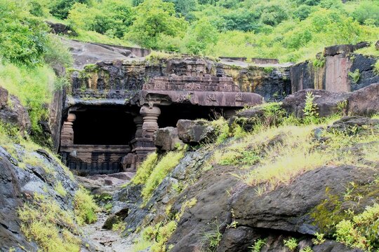 Cave number 30a at Ellora caves, a rock cut "Jain tirthankara" cave in a scenic forested green slope