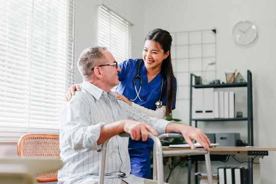 Smiling nurse assisting elderly man with walker in bright medical office, compassionate care and support