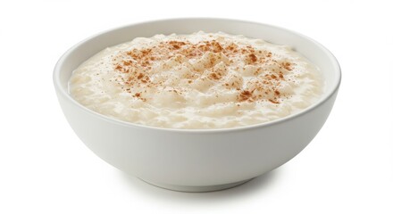 Bowl of arroz con leche Mexican style sprinkled with cinnamon isolated on a white background isolated for food or dessert uses