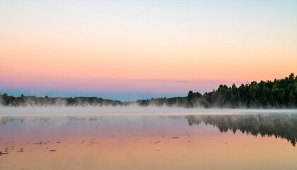 Obraz premium Misty Lake at Sunrise with Pastel Sky