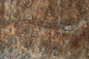 Natural stone wall and tile texture brown and grey rock surface close up, rustic masonry background, construction material detail for architecture, interior design, 3D modeling and decorative concept 