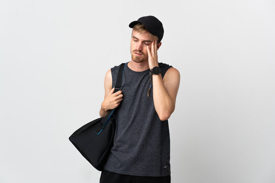 Sport blonde man isolated on white background with headache