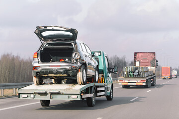 Vehicle loaded on roadside recovery truck