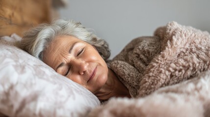 old age and people concept  happy senior woman sleeping in bed at home bedroom no logos no brands ar 169
