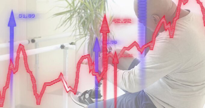 Holding prosthetic socket, rehab patient fitting onto limb with red blue graphs tracking vitals
