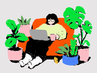 A person working on their laptop in the comfort of their home