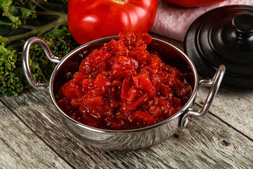 Diced ripe tomato with sauce