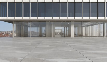Modern minimalist building with large glass windows and open concrete plaza