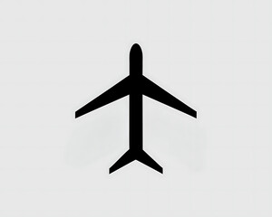 An unique black silhouette of a commercial airplane side view left to right on white background. Clean and minimal, centered graphic or logo icon of flight.