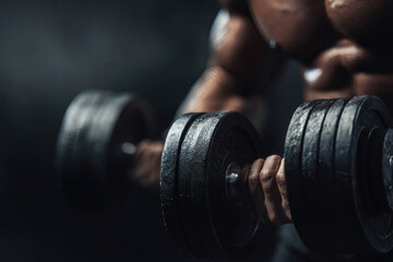 Realistic Close-Up of Muscular Arms Lifting Dumbbell in Gym