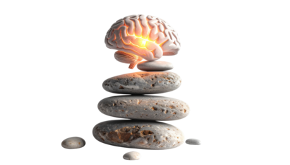 A glowing human brain balanced on stacked zen stones isolated on solid white background