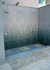 Outdoor showers near holiday resort pool