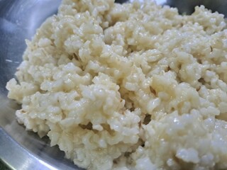 Cooked brown rice on plate 