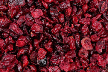 Sweetened dried cranberry fruit berries detail texture background © philip kinsey