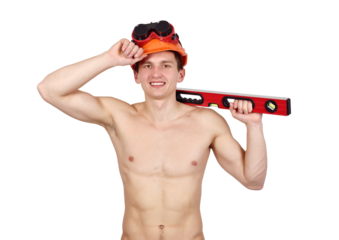 A shirtless man holds a construction level and adjusts his helmet. Concept of labor force