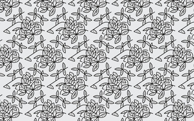 Black and white floral pattern with leaves and dots