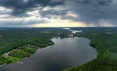 drone view of Silkeborg and the lakes and forests of the Danish Lake District © makasana photo