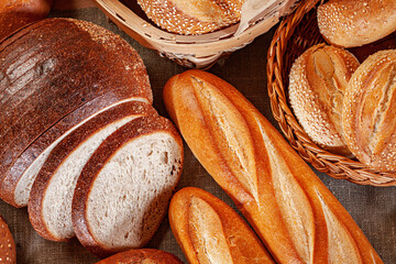 Fresh baked bread. Assorted bakery products loafs of bread and rolls...