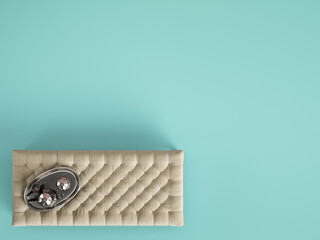 Classic tufted coffee table ottoman with decor on pastel blue color background with copy space. Flat lay