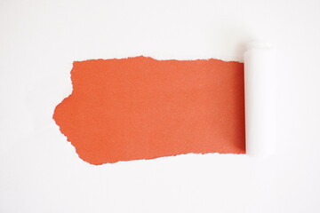 Paper torn, ripped opening. torn paper with red background