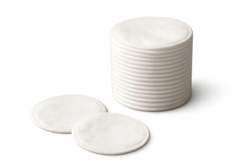 Obraz premium Stack of soft white cotton pads and two individual pads isolated on transparent