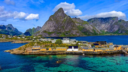 Picturesque Lofoten Islands Fjord with Traditional Rorbuer and Dramatic Mountains, Norway