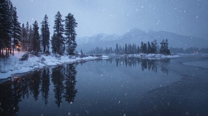 Snowy winter landscape with pine trees and lake reflections at dusk