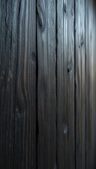 Close up view of dark, textured wooden planks in a vertical orientation with shallow depth of field