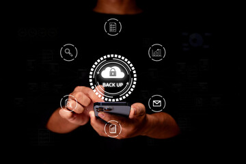 A person holding a smartphone with digital icons representing data backup and security in a dark background.